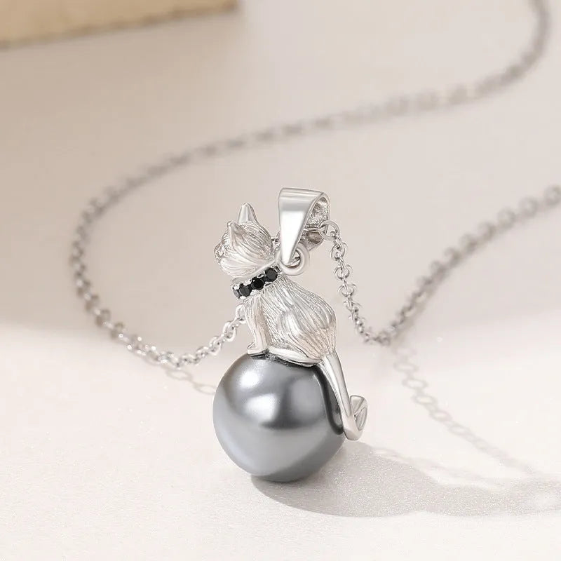 Sterling silver cat pendant necklace with electroplated finish on adjustable silver chain