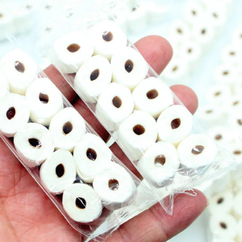 Miniature paper model of a toilet tissue roll for children's pretend play toys.