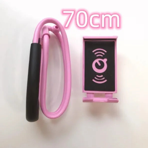 White 360-degree rotating universal smartphone holder on a table