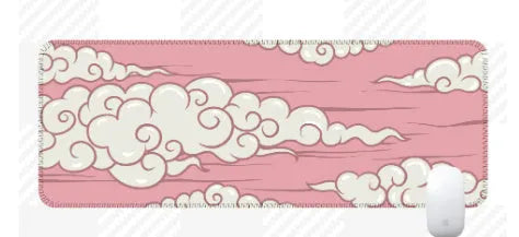 Large cloud pattern mouse pad with non-slip rubber base on a desk