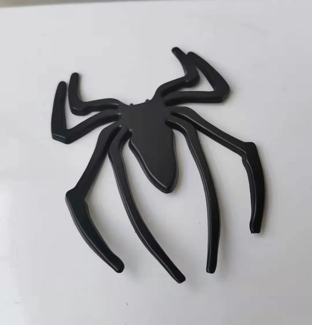 Three-dimensional zinc alloy spider bumper sticker in metallic colours