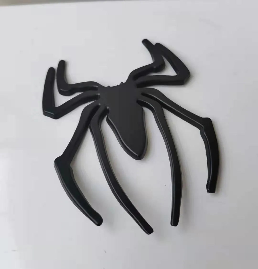 Three-dimensional zinc alloy spider bumper sticker in metallic colours