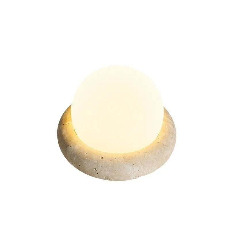 Cream modern bedside night light with remote control on wooden table