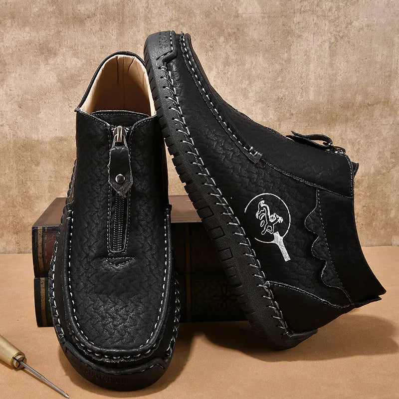 Men's black slip-on loafers with rubber soles and round toe design