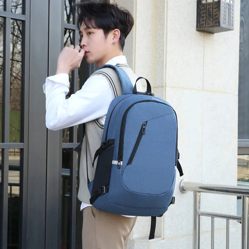 Solid colour Oxford cloth computer backpack with 20-35 litre capacity for men and women.