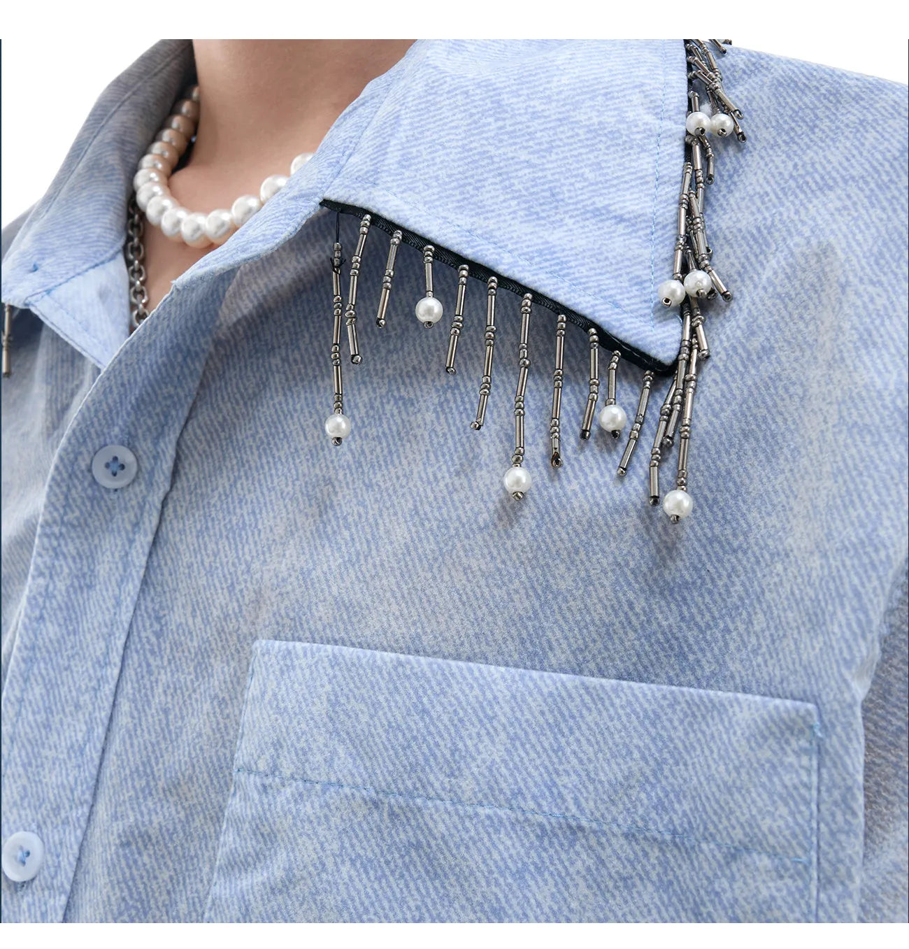 Men's loose fitting blue and white gradient short sleeve shirt with quilted texture.