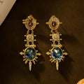 Gold geometric retro stud earrings with round shape and alloy construction