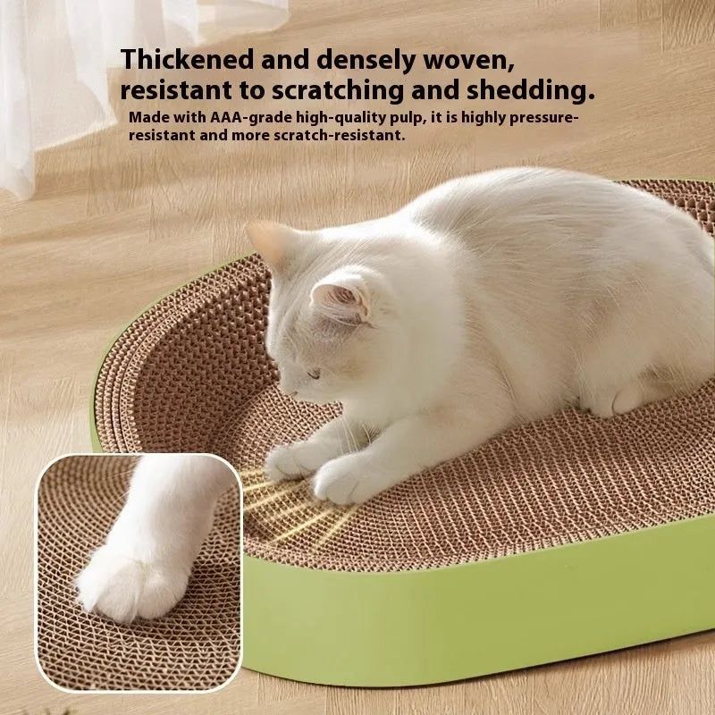 Green oval corrugated paper cat scratch board and nest bed, 55 cm in diameter.