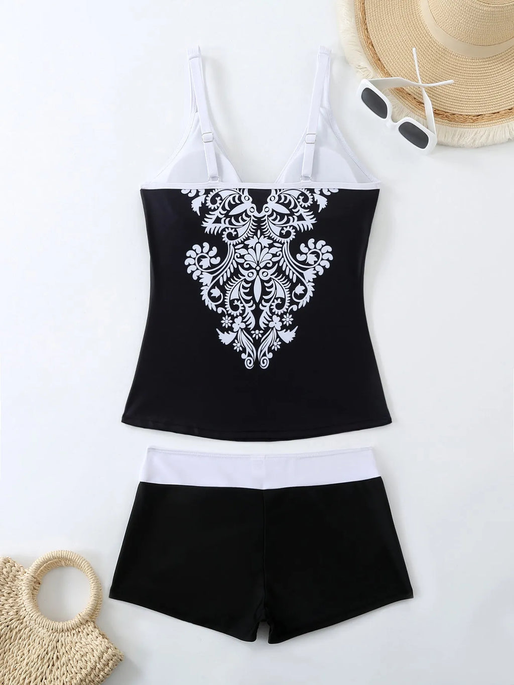 Women's plus size printed swimsuit suit in black or rose red with briefs-style design
