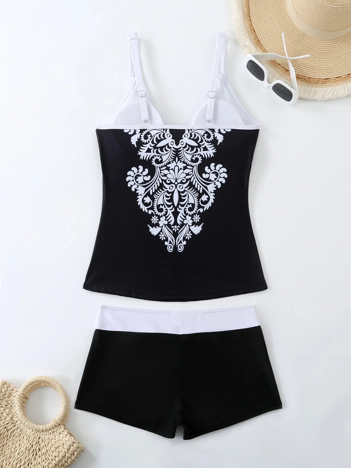 Women's plus size printed swimsuit suit in black or rose red with briefs-style design