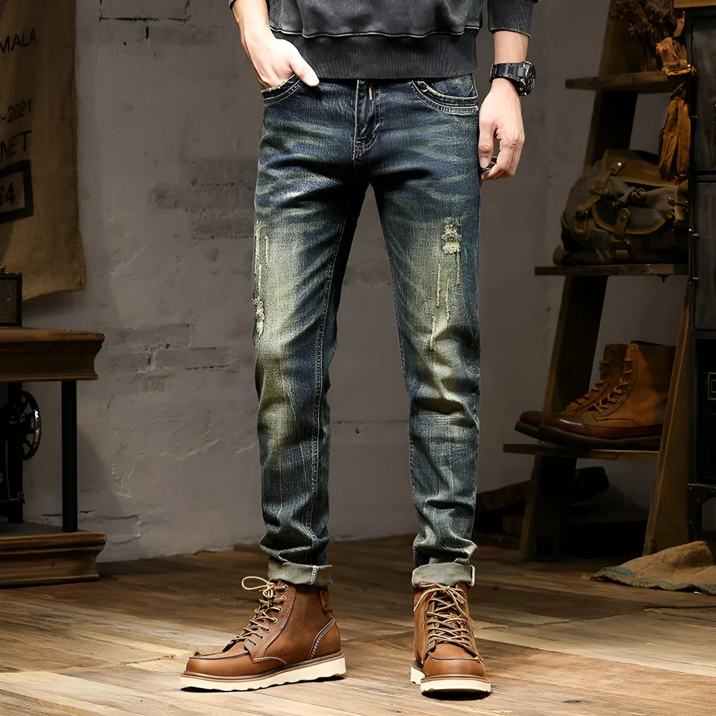Man wearing retro blue stretch denim skinny jeans with a zip fly.