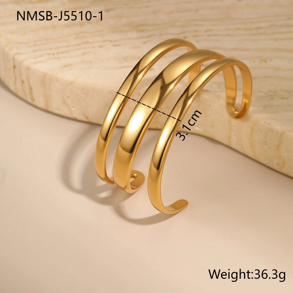 Women's stainless steel bracelet with geometric line design and 18K gold electroplating
