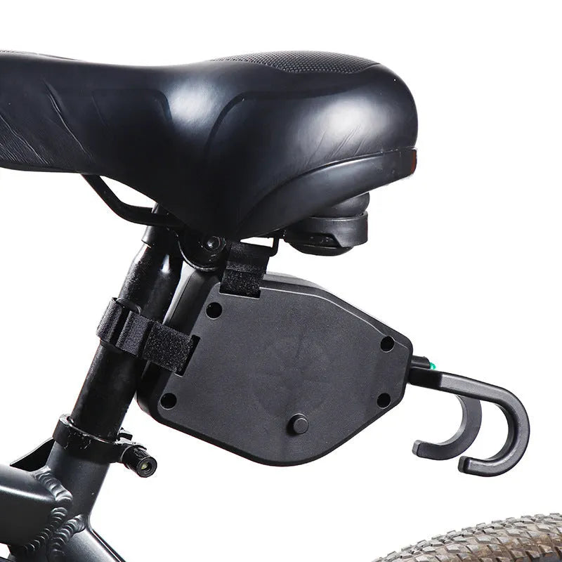 Black plastic bicycle trailer rope connecting adult bike to child trailer for family cycling