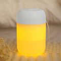 White cylindrical USB-powered mini humidifier with aromatherapy function on desk