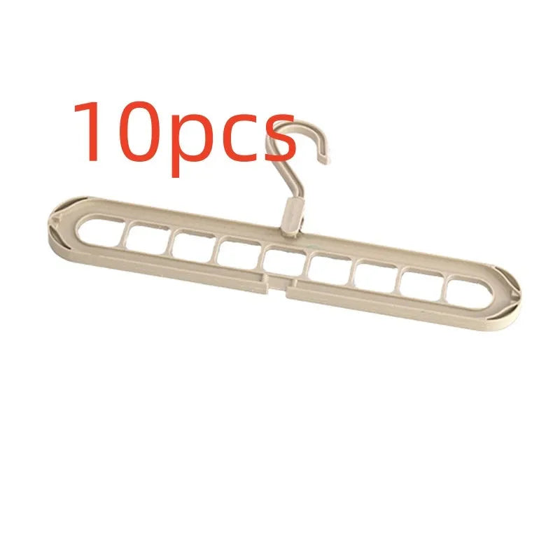 Multifunctional plastic hanger with nine holes for folding trousers, shown in beige