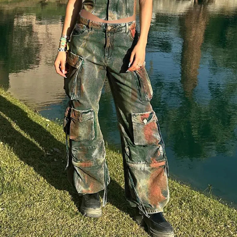 Loose fit multi-pocket cargo denim trousers with gradient colour pocket detail and collage stitching.
