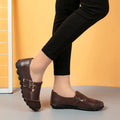 Button men's low-top casual leather loafers with Velcro strap closure in multiple colours.