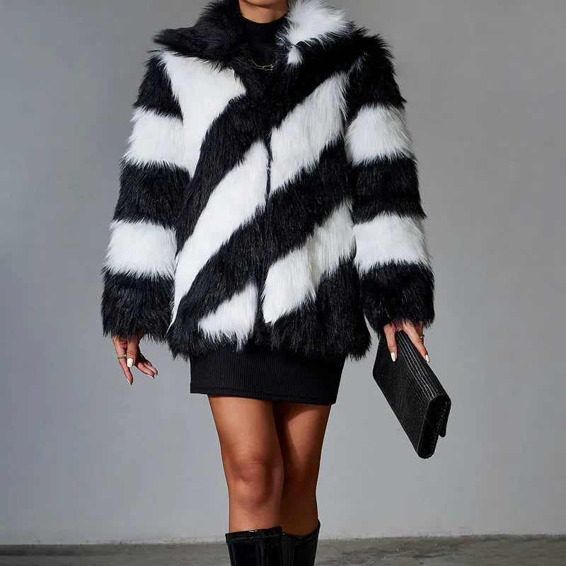Women's lapel contrast colour faux fur coat with a detachable fur collar on a hanger