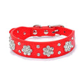 Black PU leather dog collar with silver rhinestone flower pattern and metal D-ring for small dogs.