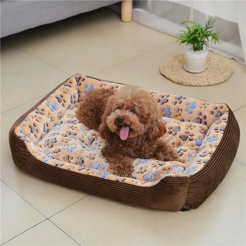 Beige plush sofa-style dog bed with raised sides for a small dog