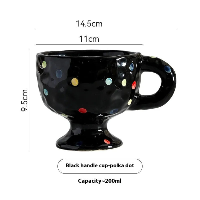 Hand-pinched irregular shaped ceramic mug in a solid colour, modern simple design