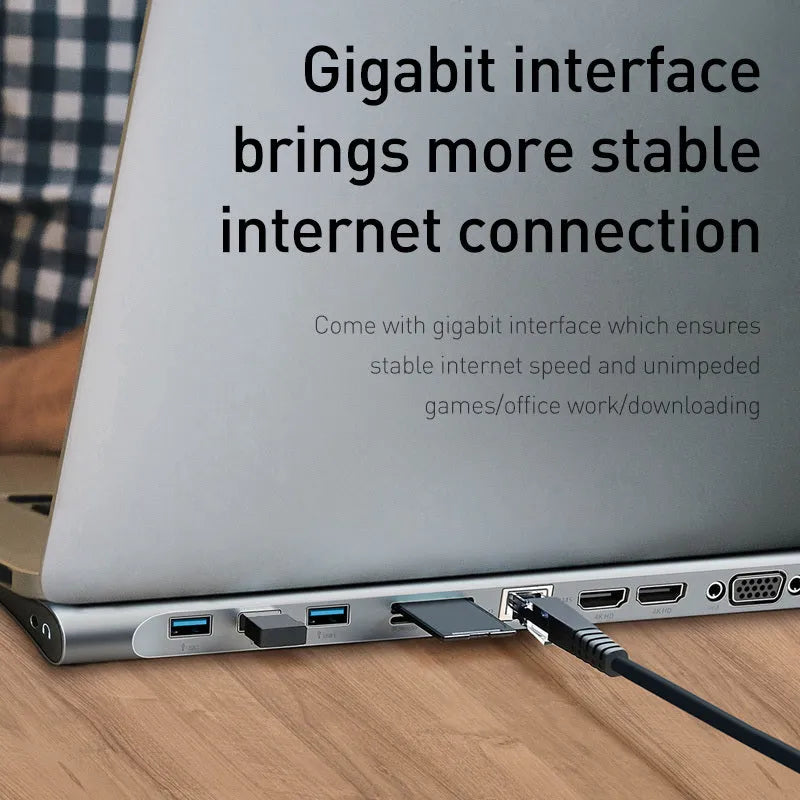 Grey ten-port USB-C hub docking station with cooling bracket showing HDMI, VGA and Ethernet ports