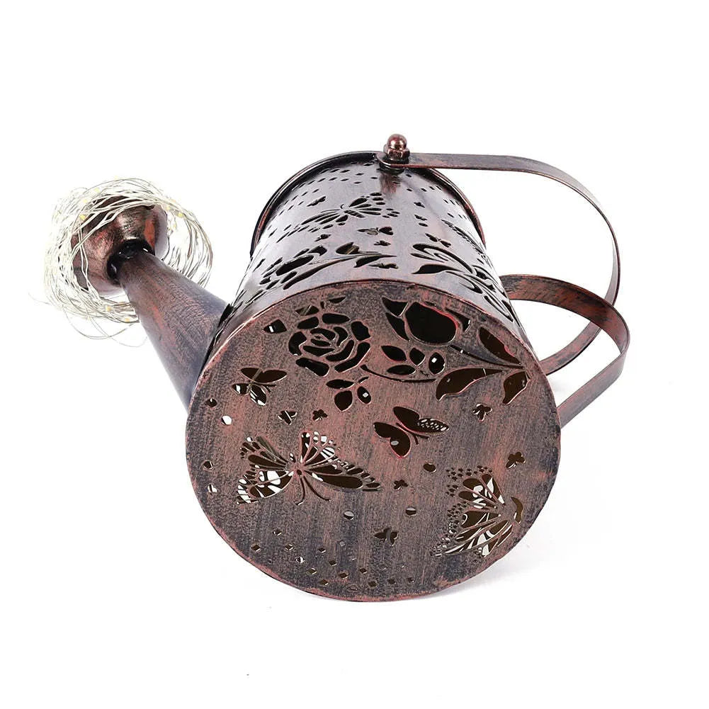 Solar garden lamp with tapered butterfly pattern design in iron construction