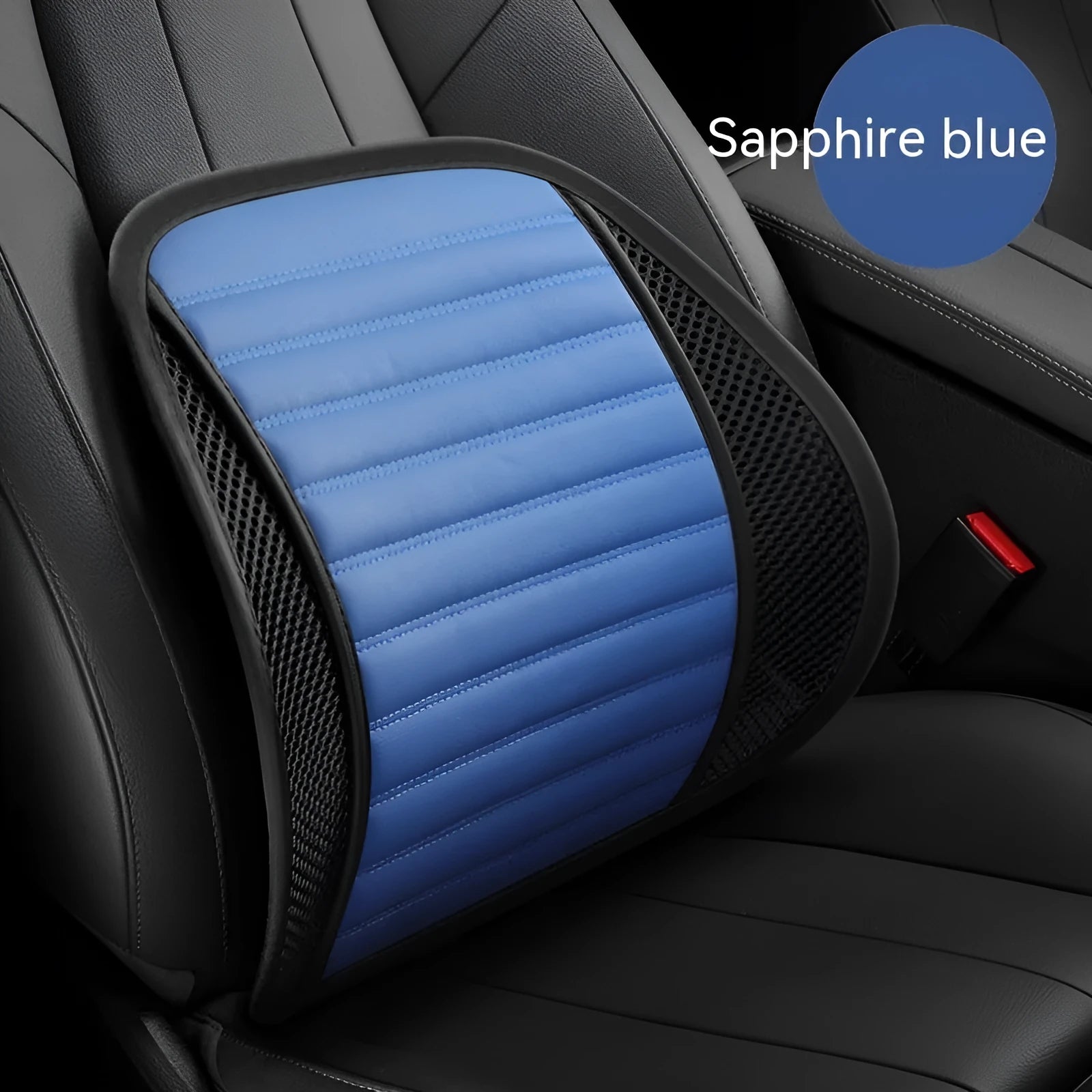 Leather lumbar support cushion with removable memory foam pad in sapphire blue colour on a car seat.