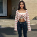 Striped long-sleeved pullover sweater in mercerised cotton, shown in blue with an exposed navel design.