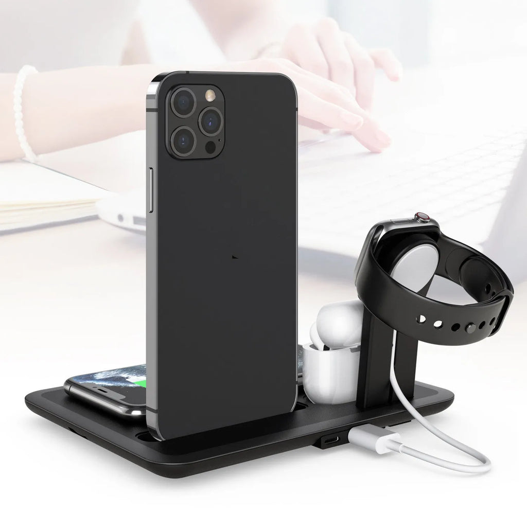 Black wireless charging desktop station holding a mobile phone, with ports for watch and headphones.