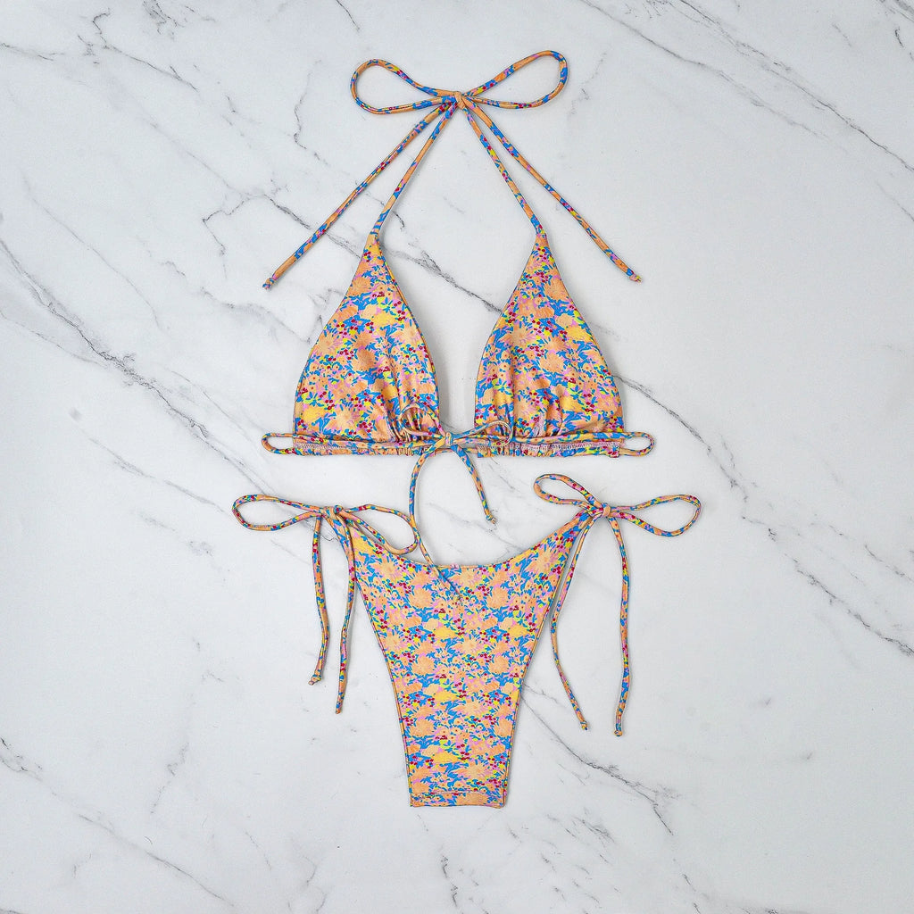 Women's lace-up bikini swimsuit with backless European styling and brief pants