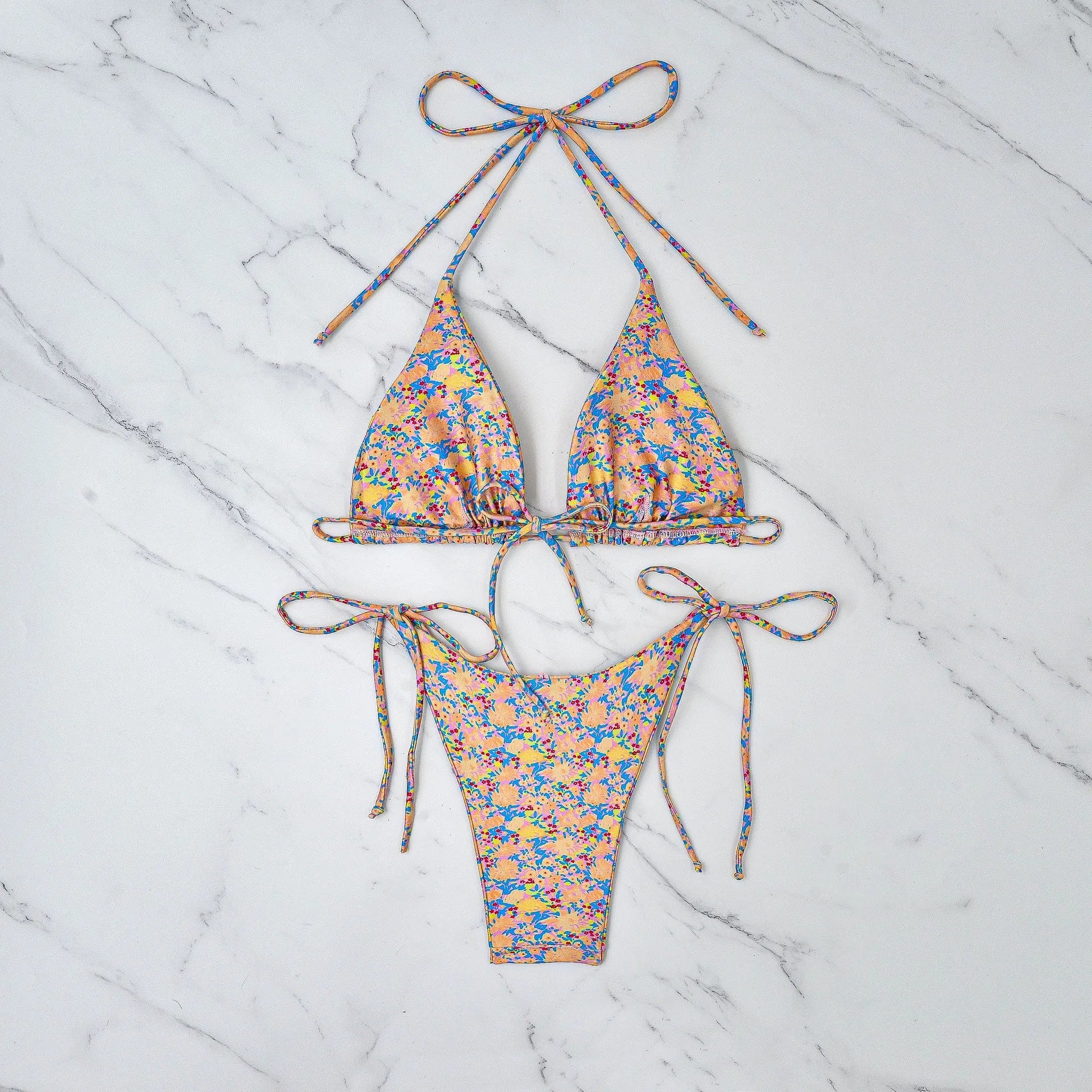Women's lace-up bikini swimsuit with backless European styling and brief pants