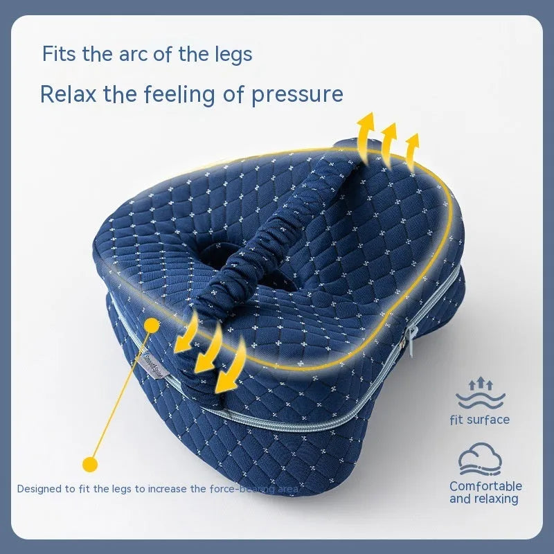 Heart-shaped dark blue memory foam leg pillow measuring 25x23x13cm for adult use