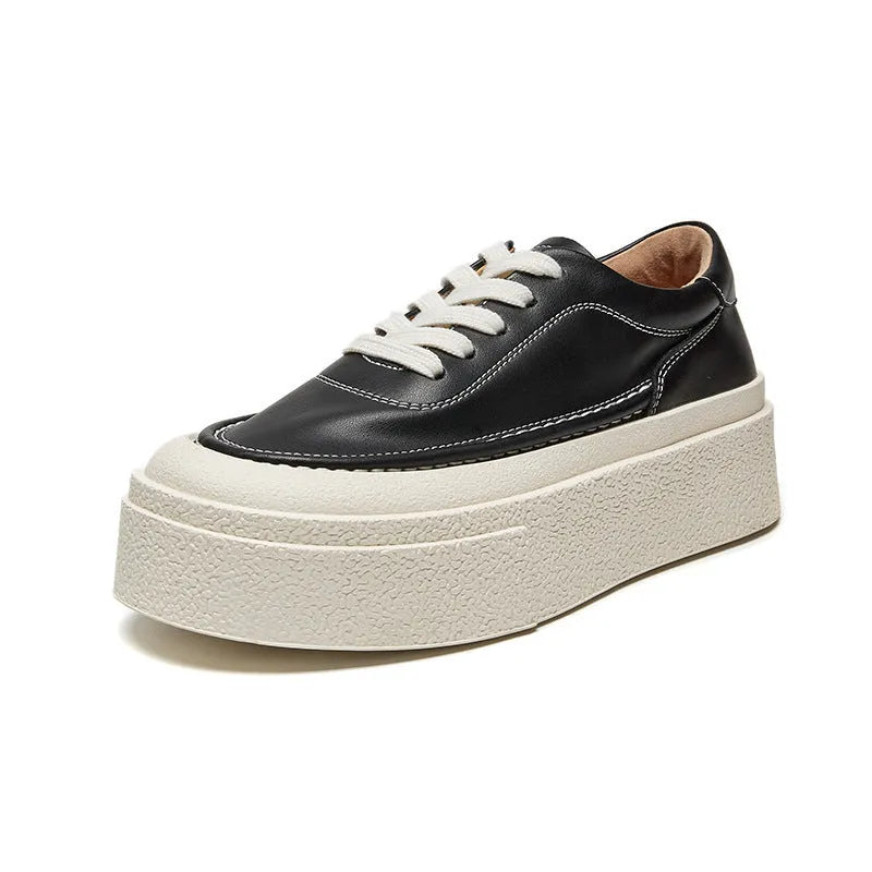 Women's black platform sports board shoes with embossed cowhide upper and lace-up closure