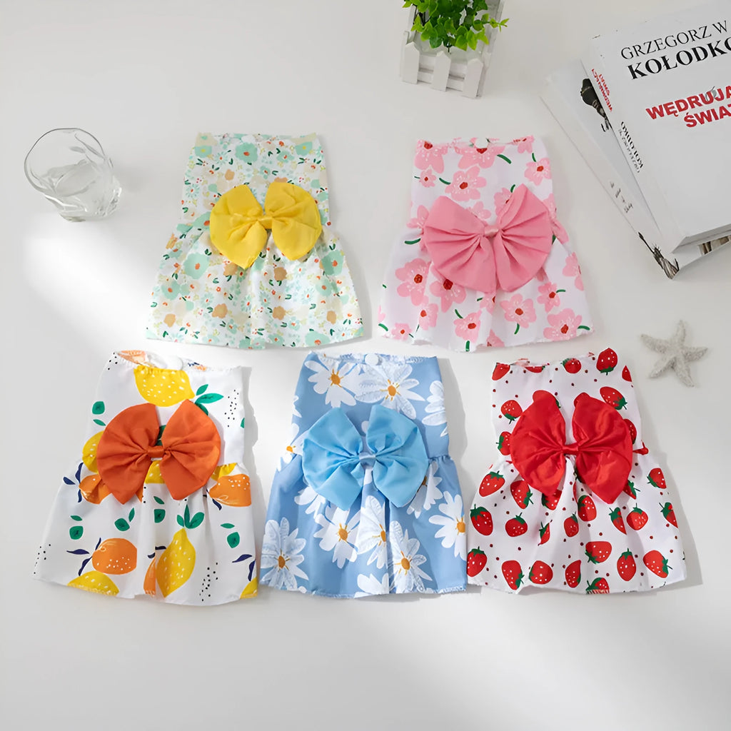 Orange bow floral butterfly pattern polyester dress on a small dog