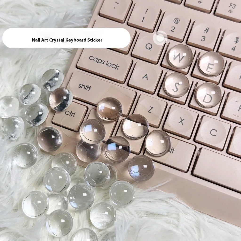 Crystal glass ball keyboard stickers in 12x6mm size on a white keyboard showing raised design