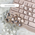 Crystal glass ball keyboard stickers in 12x6mm size on a white keyboard showing raised design