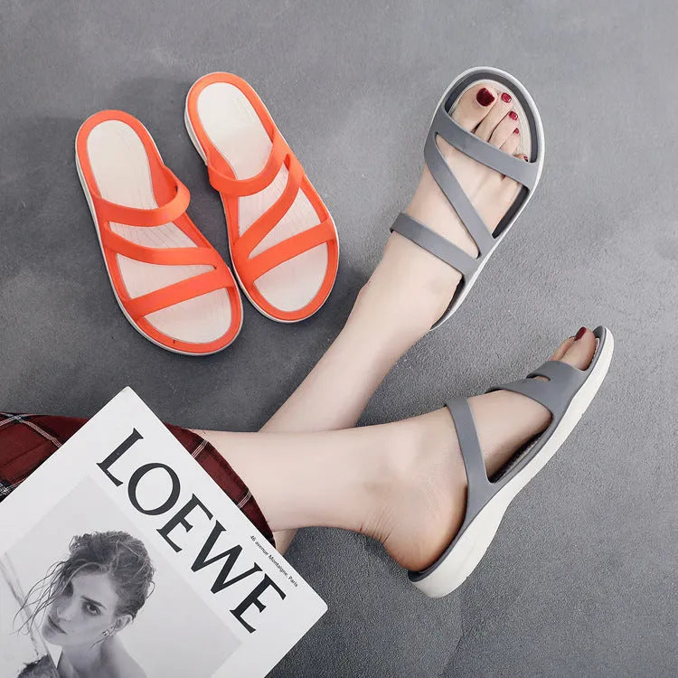 Women's solid colour casual beach sandals made from lightweight PP material, shown in red.