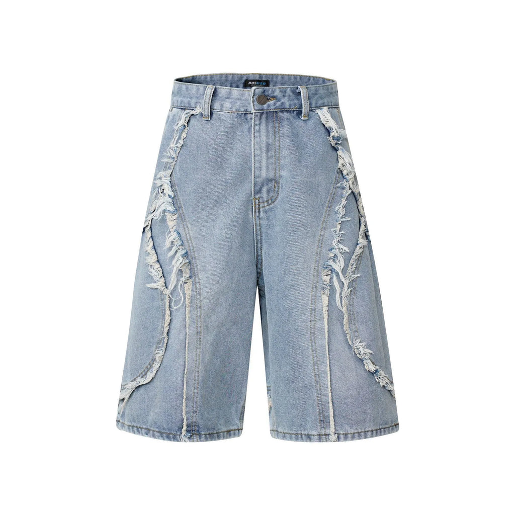Distressed raw edge denim shorts in a straight leg cropped cut, shown in light blue colour.