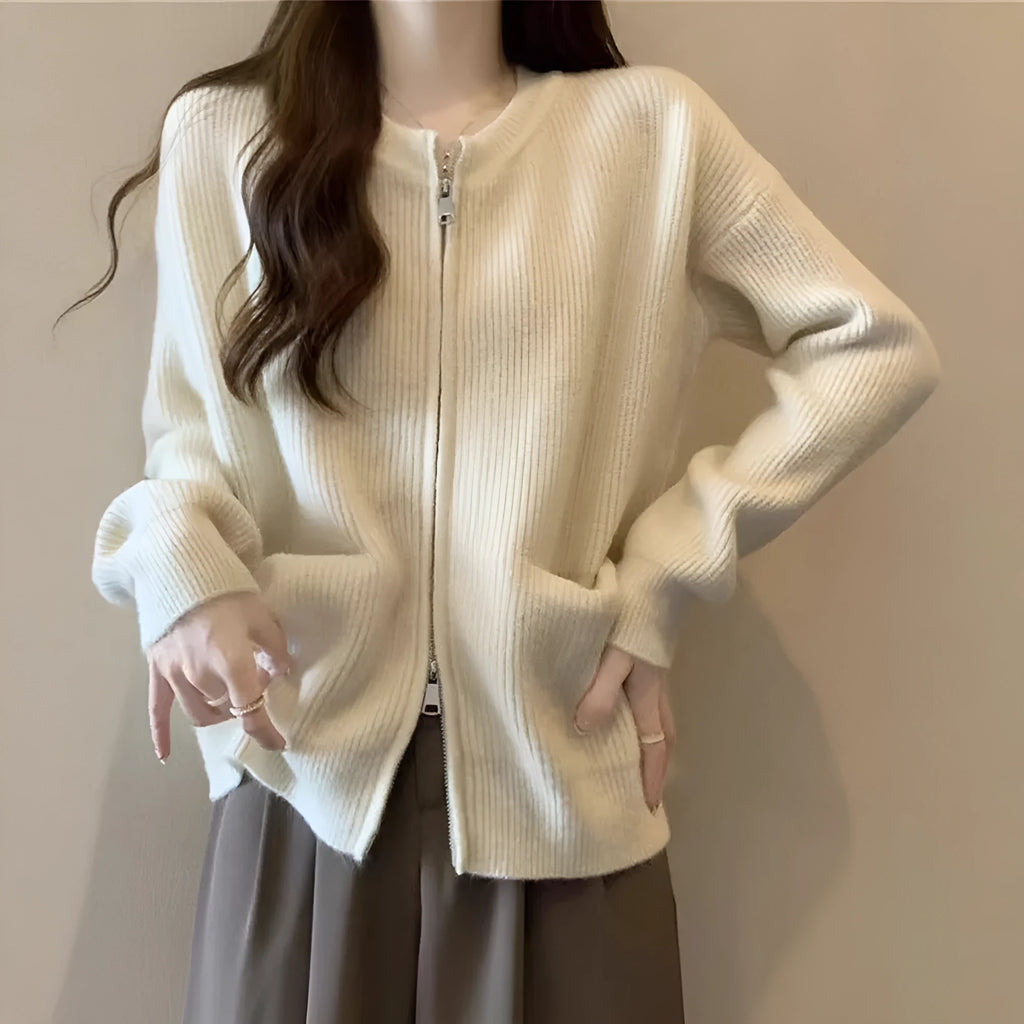 Women's soft sweater coat in temperature-sensitive fabric showing beige colour option with long sleeves and cardigan styling