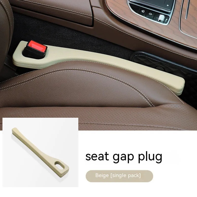 Polyurethane car seat gap filler strip in black colour, shown next to a vehicle centre console.