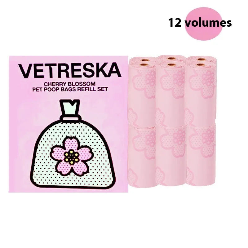 Portable dog poo bag dispenser capsule with scented inner roll in strawberry, orange or cherry blossom options