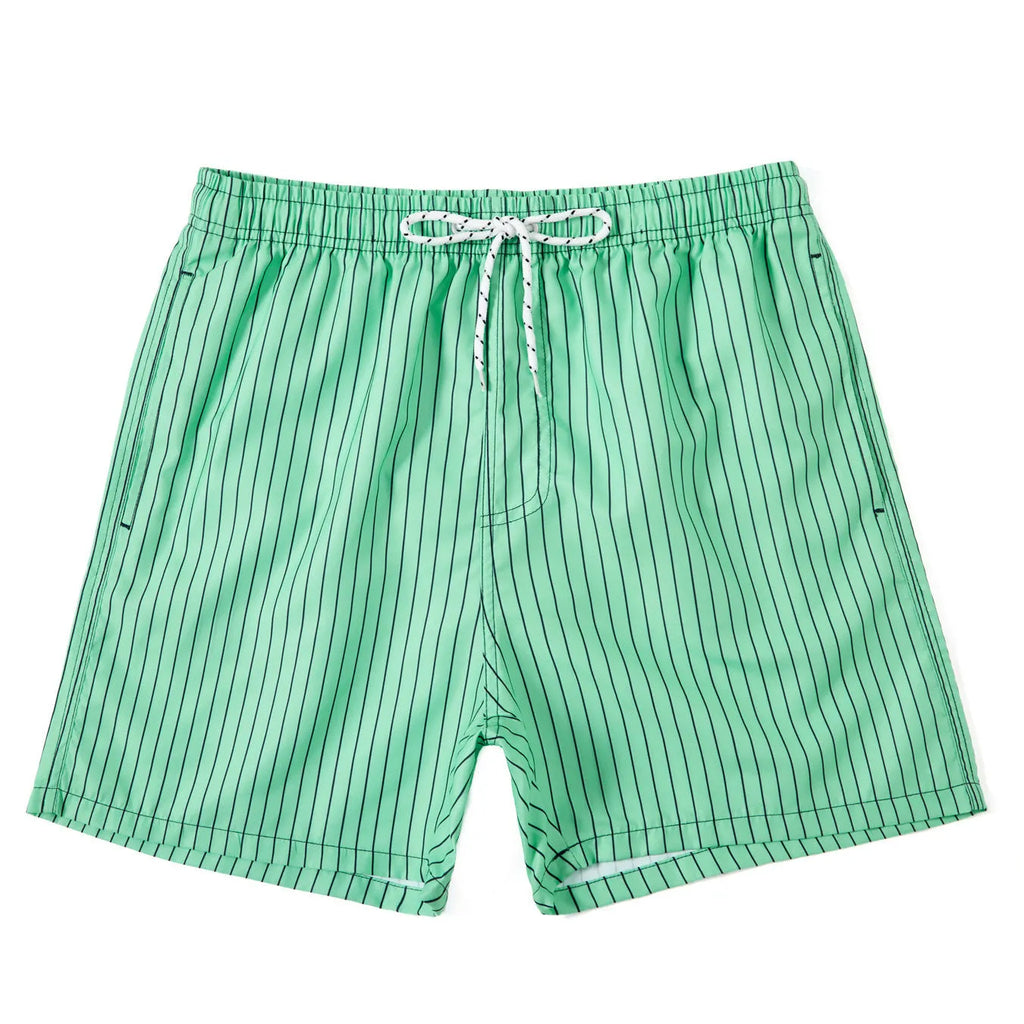 Man wearing grey striped polyester beach shorts with a straight leg opening
