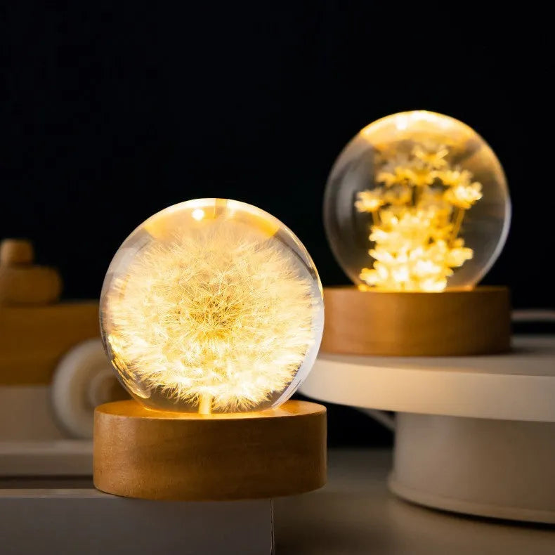 3D dandelion eternal flower inside a luminous resin crystal ball on a beech wood stand base.