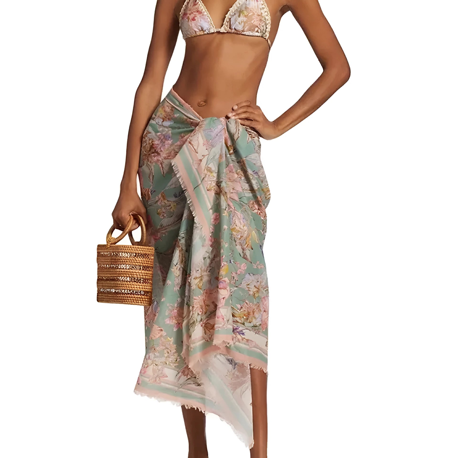 Creamy-white floral patterned women's three-piece bikini set with skirt.
