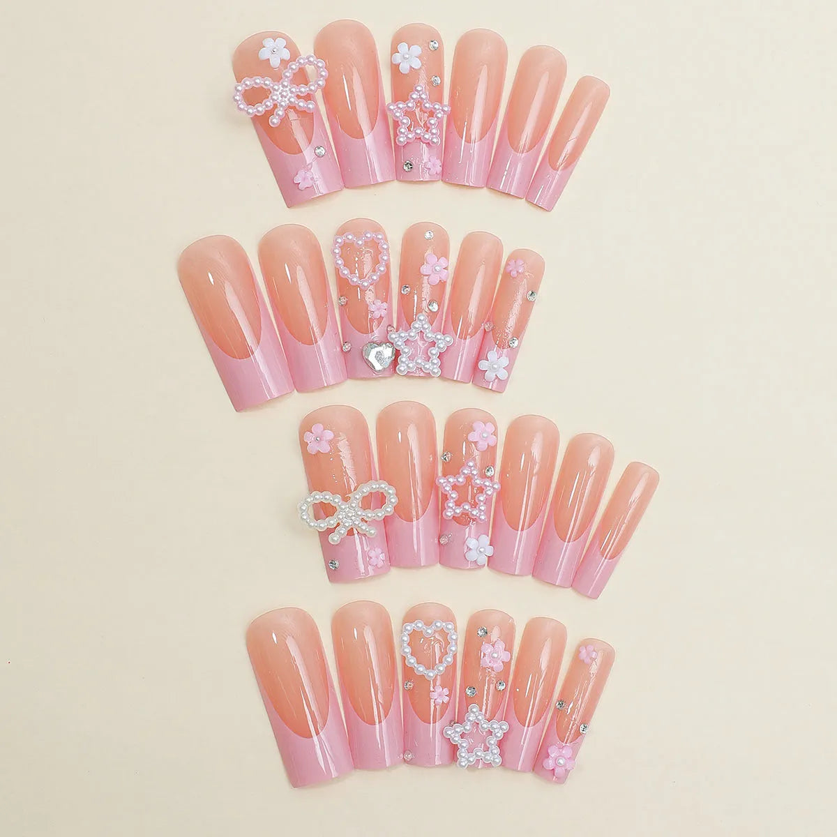 French spot drill bow nail art decorations in love pattern design, colour XB-70-48, in plastic armour suit.