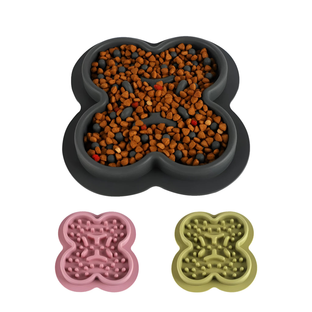 Silicone pet licking pad slow feeder mat in green colour with textured surface, showing scale.