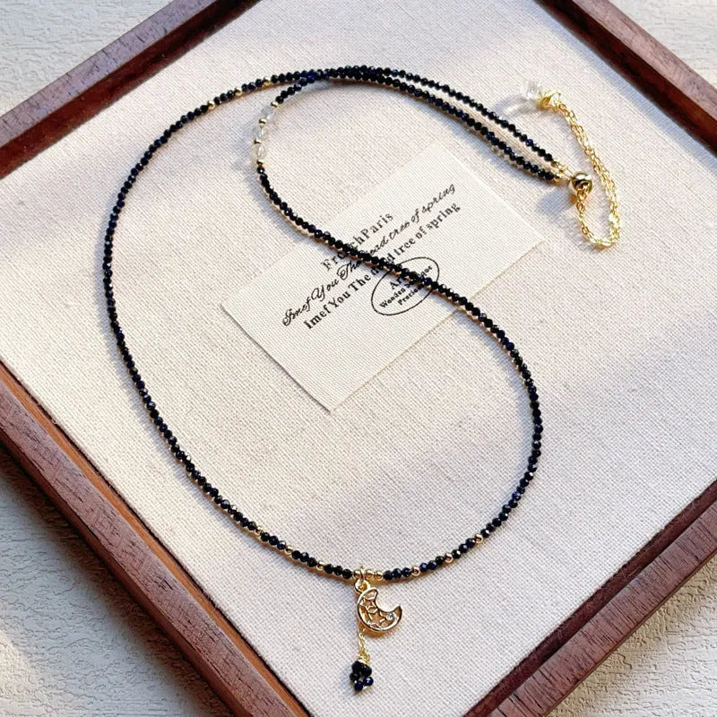 Blue sand stone three-ring multi-layer bracelet with gold-coloured metal detailing and cut stone texture