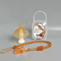 Small pink mushroom-shaped latex chewing gum in a transparent box with a chain.