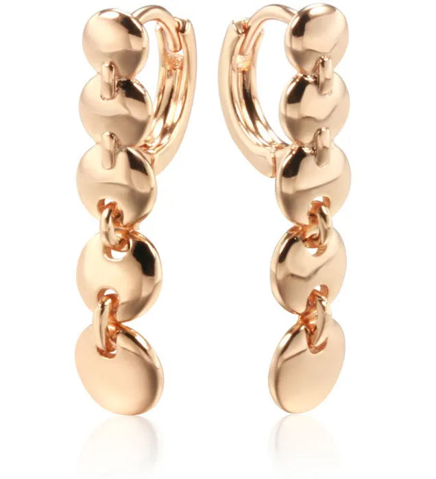 A pair of gold-coloured retro long circle earrings with a woven texture, for pierced ears.